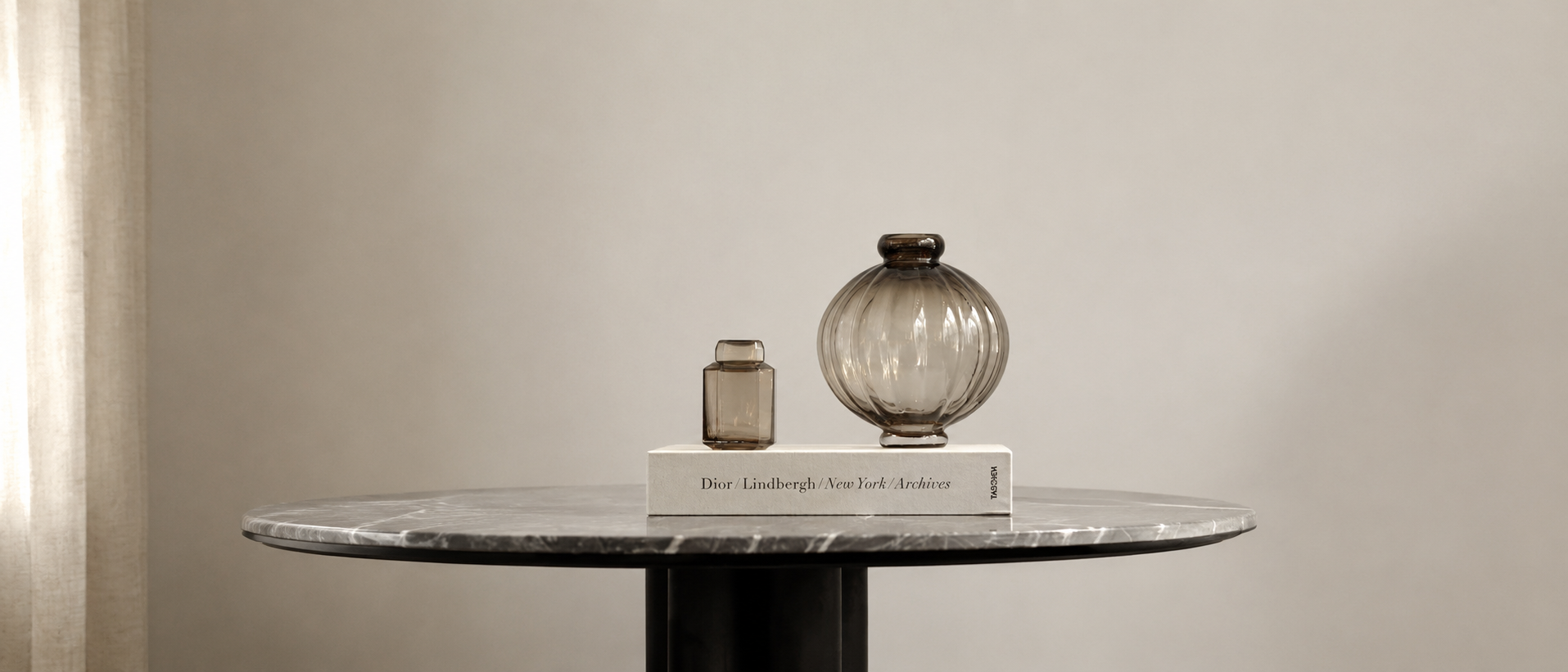Considered home objects arranged in a calm interior